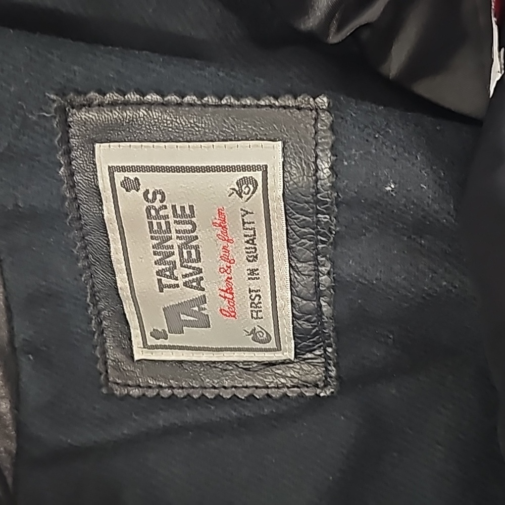 Leather coat with faux mink